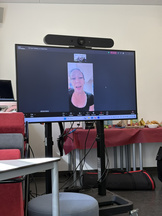 Maria R. Palacios in a meeting via Zoom.